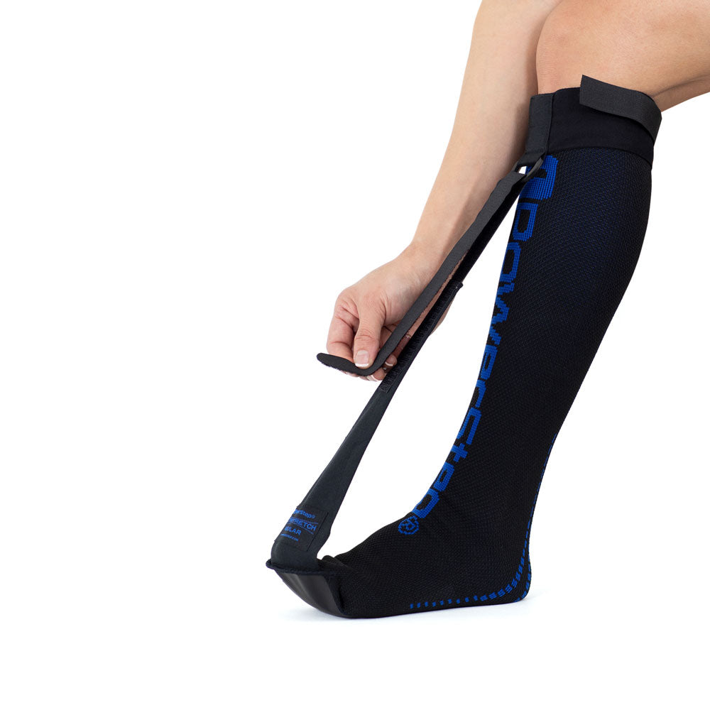 UltraStretch Night Sock for men and women in use, adjustable strap provides a gentle and effective stretch to help speed recovery from Plantar Fasciitis
